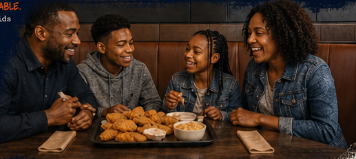 A family sharing Watson Ridge chicken around the table